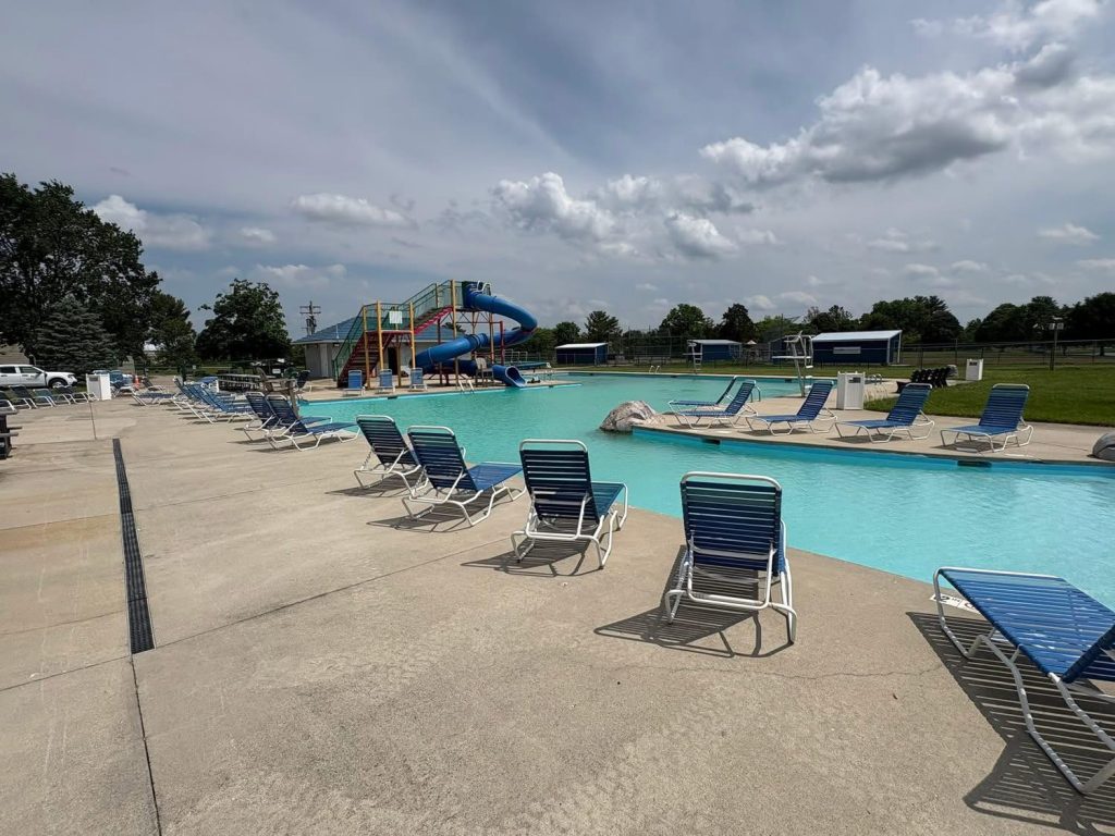 Pool Picture/lounge chairs and pool slide